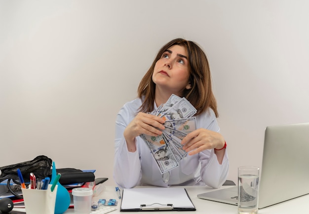Person reviewing debt-to-income and money decisions