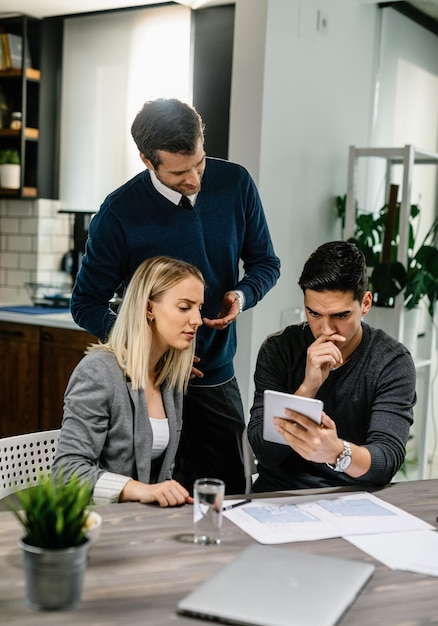Couple meeting with an insurance agent about loan conditions