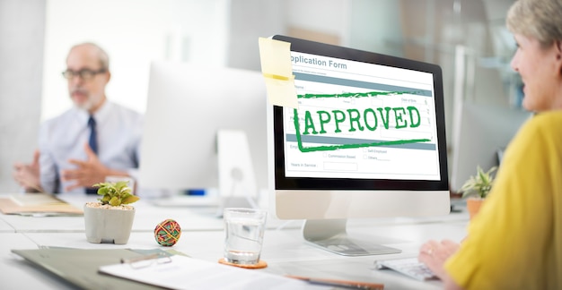 Approved agreement and validation paperwork on a desk