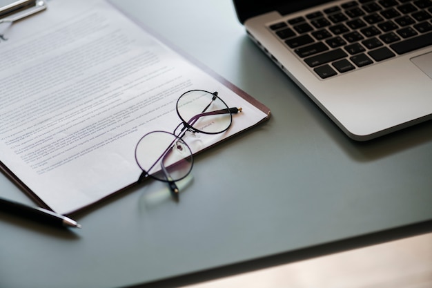 Flat lay of business documents and office supplies