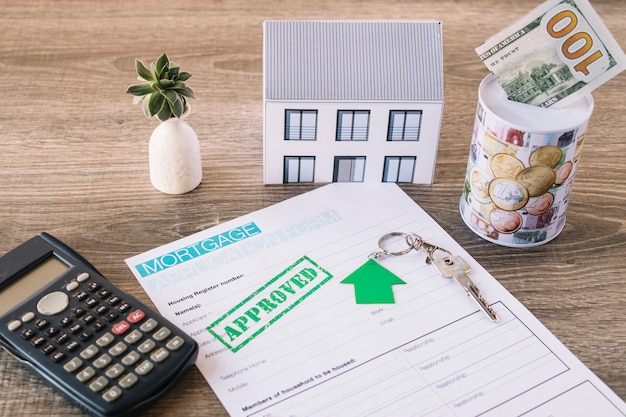 Real estate theme composition with house keys and paperwork