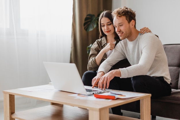 Couple making remodel plans for their household together