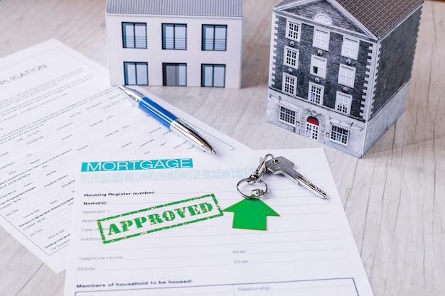 New house keys with mortgage paperwork